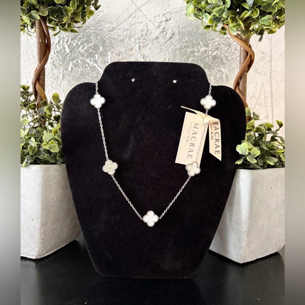 Macrae&Co elegant double sided flower necklace in silver and seashell.